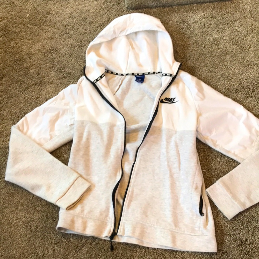 Barely worn Men’s NIKE lined jacket with hood size Small